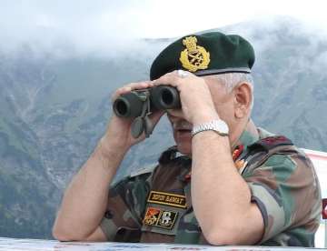 Army Chief General Bipin Rawat looks across Line of Control (LoC) into Pakistan Occupied Kashmir (PoK). He reviewed the operational preparedness of the formations deployed on Indo-Pakistan border during his visit to Northern Command on 30 and 31 August.
 