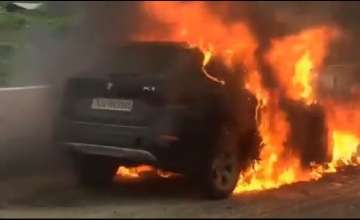 Moving BMW catches fire in Ahmedabad | Watch video