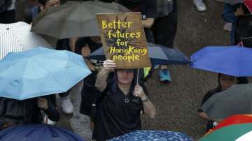 100,000 hit streets as protests continue to roil Hong Kong