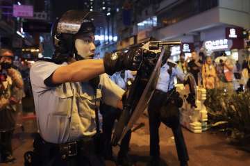 Hong Kong police draw guns in latest protest violence