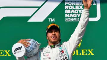 Lewis Hamilton overtakes Max Verstappen late on to win Hungarian GP