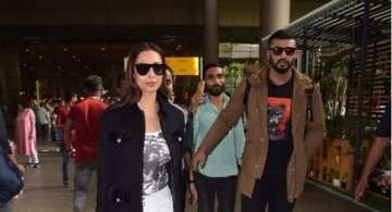 Arjun Kapoor's protective arm around Malaika Arora is winning hearts all over the internet