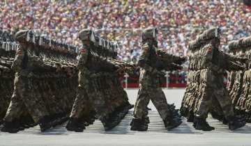 China to hold biggest ever military parade on Tuesday