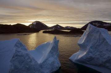 File photo shows an aerial view of large Icebergs floating as the sun rises near Kulusuk, Greenland