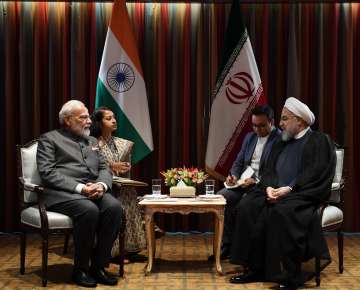 PM Modi meets Iranian President Hassan Rouhani; exchange views on regional, global developments