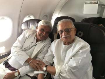 Shabana Azmi took to the micro-blogging site and posted a picture that had Akhtar and Gulzar in a flight.