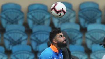 ISL: Virat Kohli unveils FC Goa's new home jersey