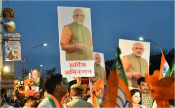 BJP supporters gathered in large numbers outside Delhi airport