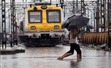 Mumbai Local Train Status: Several trains delayed, cancelled due to heavy rain. These trains are in service