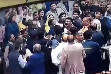Action in Pakistan Parliament: Minister engages in scuffle with Opposition members | VIDEO