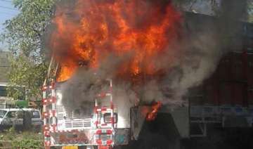 Two charred to death, four injured as trucks catch fire