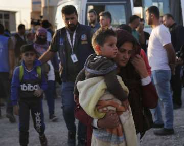 Aid groups scramble to reach Syrians as battle lines shift