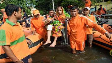 MP: Villagers carry bodies for last rites in waist-deep water