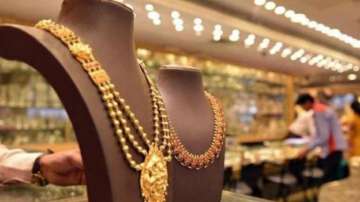 Gold falls marginally by Rs 30; silver up Rs 150