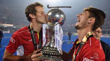 Nicolas De Kerpel and Felix Denayer of Belgium celebrate with the trophy during the FIH Men's Hockey World Cup Final between Belgium and the Netherlands at Kalinga Stadium on December 16, 2018 in Bhubaneswar, India.