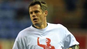 Jamie Carragher apologises to Patrice Evra for wearing Luis Suarez T-shirts