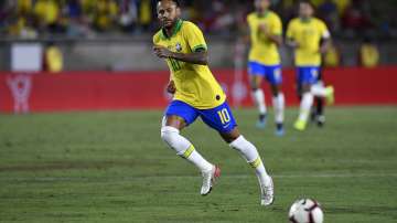 Neymar Jr. #10 of Brazil eyes the ball in the 2019 International Champions Cup match against Peru on