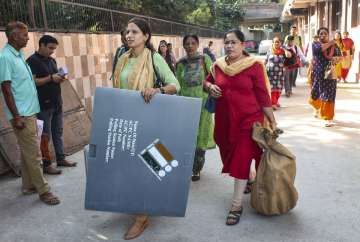 Polling officials heading to election booths