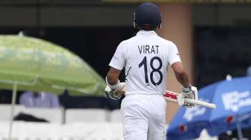 India's captain Virat Kohli leaves the field after being dismissed by South Africa's Anrich Nortje during the third and last cricket test match between India and South Africa in Ranchi, India