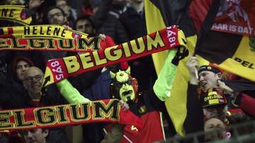 Belgium supporters celebrate at the end of the Euro 2020 group I qualifying soccer match between Belgium and Cyprus at the King Baudouin stadium in Brussels, Tuesday