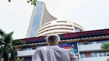 Sensex scales new closing peak, soars 530 points; Nifty above 12,050