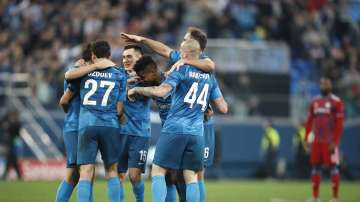 Zenit players celebrate after Zenit's Magomed Ozdoyev scored his side's second goal during the Champions League group G soccer match