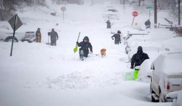 Schools, offices close as long-lived storm clobbers US East