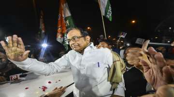 Chidambaram walks out of Tihar jail; Karti, scores of supporters welcome him