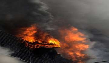 Hospital boundary wall damaged, shanties gutted in blaze