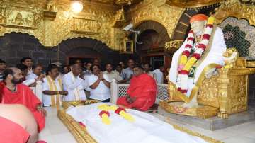 On eve of Karnataka bypolls counting, H D Deve Gowda at Saibaba temple