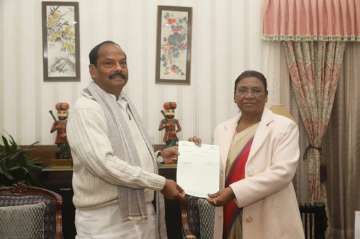 The outgoing chief minister of Jharkhand, Raghubar Das, tenders his resignation  to Governor Draupadi Murmu, at Raj Bhavan in Ranchi on Monday