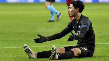 Salzburg's Takumi Minamino reacts during the group E Champions League soccer match between Salzburg and Liverpool