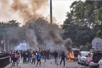 Protestors pelt stones at police personnel after their clash during a rally against NRC and amended Citizenship Act, at Parivartan Chowk in Lucknow, Thursday, Dec. 19, 2019. (PTI Photo)?
?