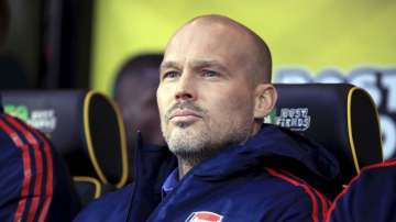 Arsenal's interim head coach Freddie Ljungberg looks out during the match against Norwich City, during their English Premier League soccer match at Carrow Road in Norwich