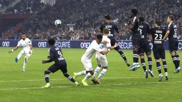 Marseille's Dimitri Payet shoots a free kick during the French League One soccer match between Marseille and Bordeaux at the Velodrome stadium in Marseille