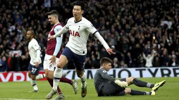 Tottenham Hotspur's Son Heung-min celebrates scoring his side's third goal of the game during the English Premier League soccer match between Tottenham Hotspur and Burnley at the Tottenham Hotspur Stadium, London