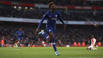 Chelsea's Tammy Abraham celebrates after scoring his side's second goal during the English Premier League soccer match between Arsenal and Chelsea