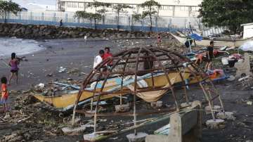 Toll in Philippines typhoon reaches 21