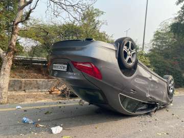 Two injured as speeding Mercedes turns turtle in Greater Noida; see pictures