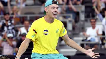 Alex de Minaur of Australia reacts after he won his match against Denis Shapovalov of Canada at the ATP Cup tennis tournament in Brisbane