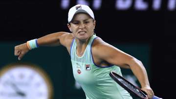 Australia's Ashleigh Barty celebrates after defeating Alison Riske of the U.S. during their fourth round singles match at the Australian Open tennis championship in Melbourne