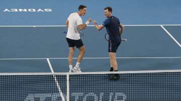 Jamie Murray and Joe Salisbury of Britain during their ATP Cup tennis doubles match in Sydney