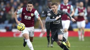 Leicester City's James Maddison, right, and Burnley's Ashley Westwood during their English Premier League soccer match at Turf Moor in Burnley
