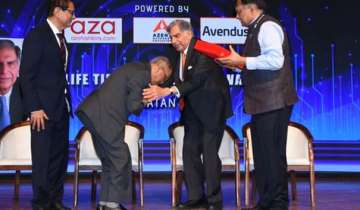 Video: Infosys co-founder Narayana Murthy touches Ratan Tata's feet on stage 