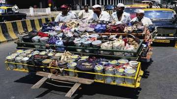 Ensure no fare hike in rail luggage passes: Dabbawalas to government