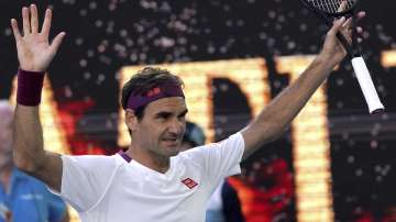 Switzerland's Roger Federer reacts after defeating Tennys Sandgren of the U.S. in their quarterfinal match at the Australian Open tennis championship in Melbourne