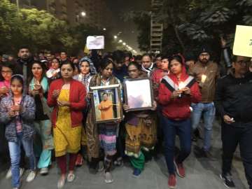 Gaurav Chandel murder: People take out candlelight march in Gaur City, Greater Noida 