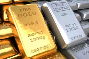 Gold rises Rs 63 on weak rupee, global cues