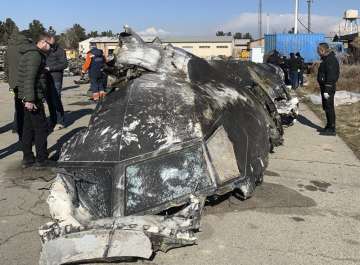 Wreckage of the Ukraine International Airlines Boeing 737-800 at the scene of the crash in Shahedshahr, southwest of the capital Tehran, Iran. (Ukrainian Presidential Press Office via AP)
 