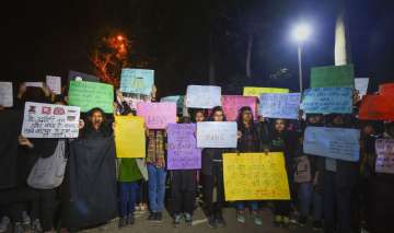 JNU students hold placards during a protest against ABVP in New Delhi